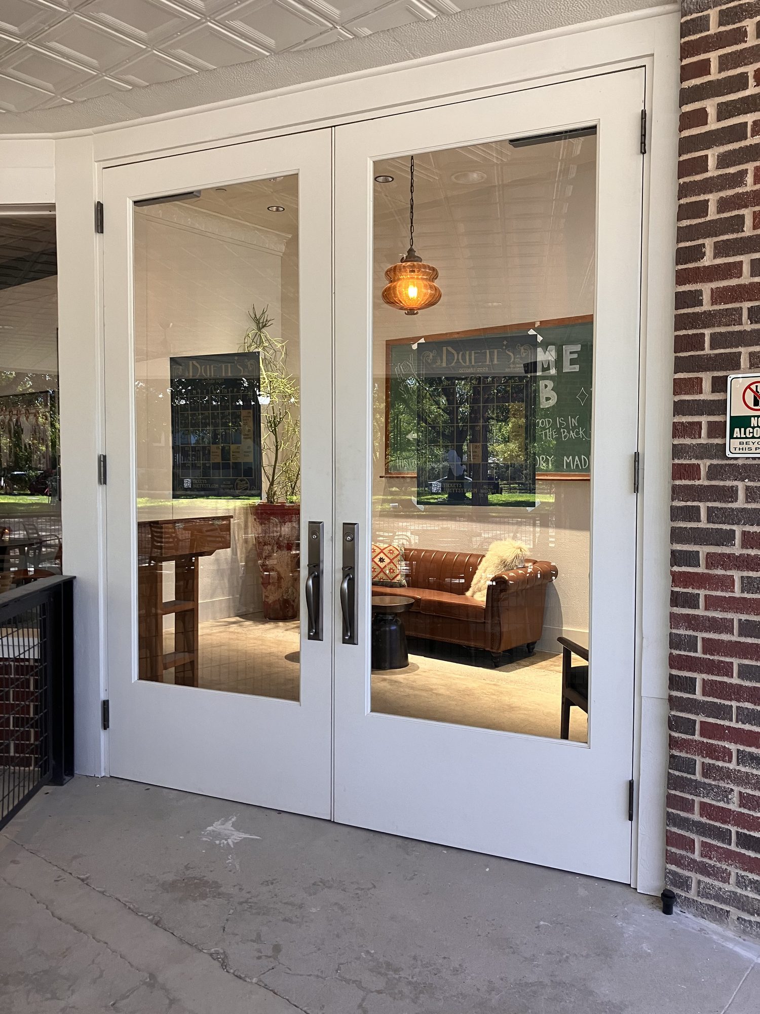 Martindale Motor Company Building window work in progress