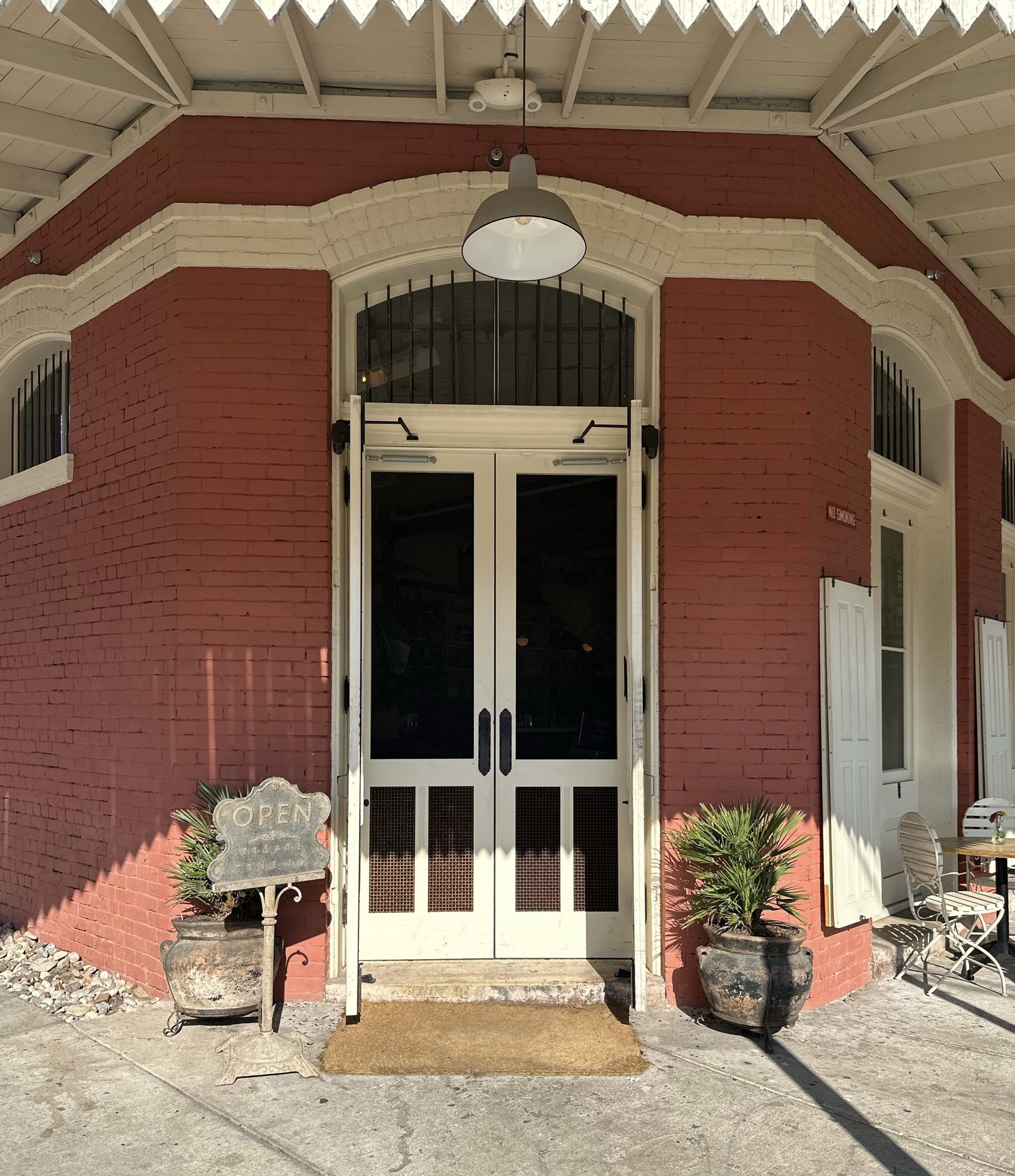 Door restoration detail at Uptown Sports Club