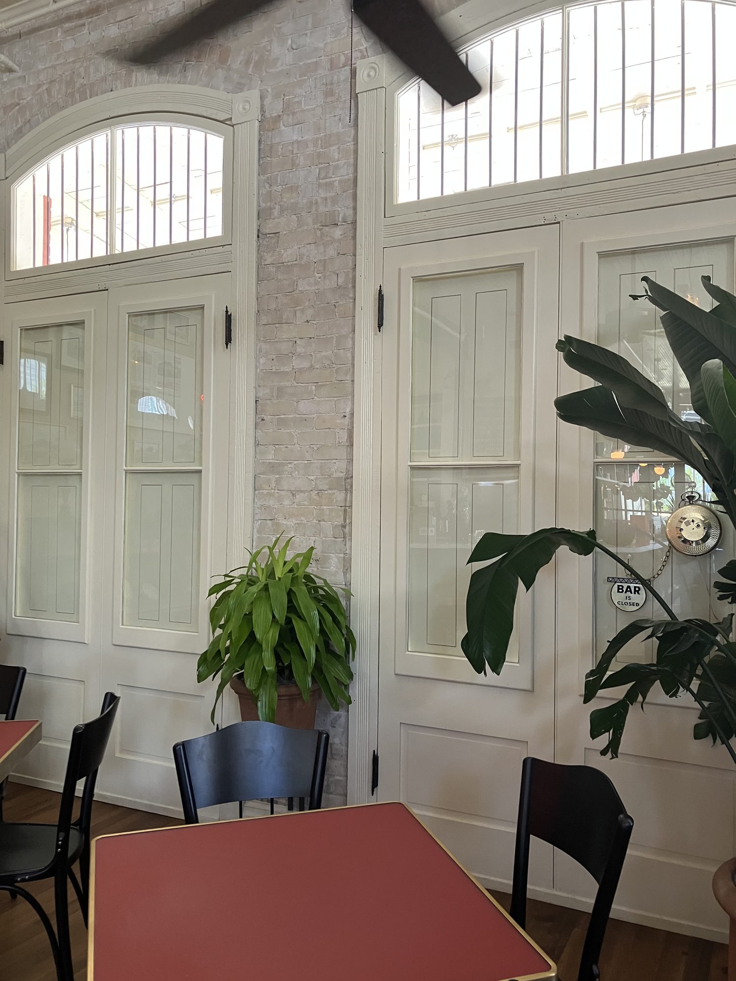 Restored window at the historic Uptown Sports Club building