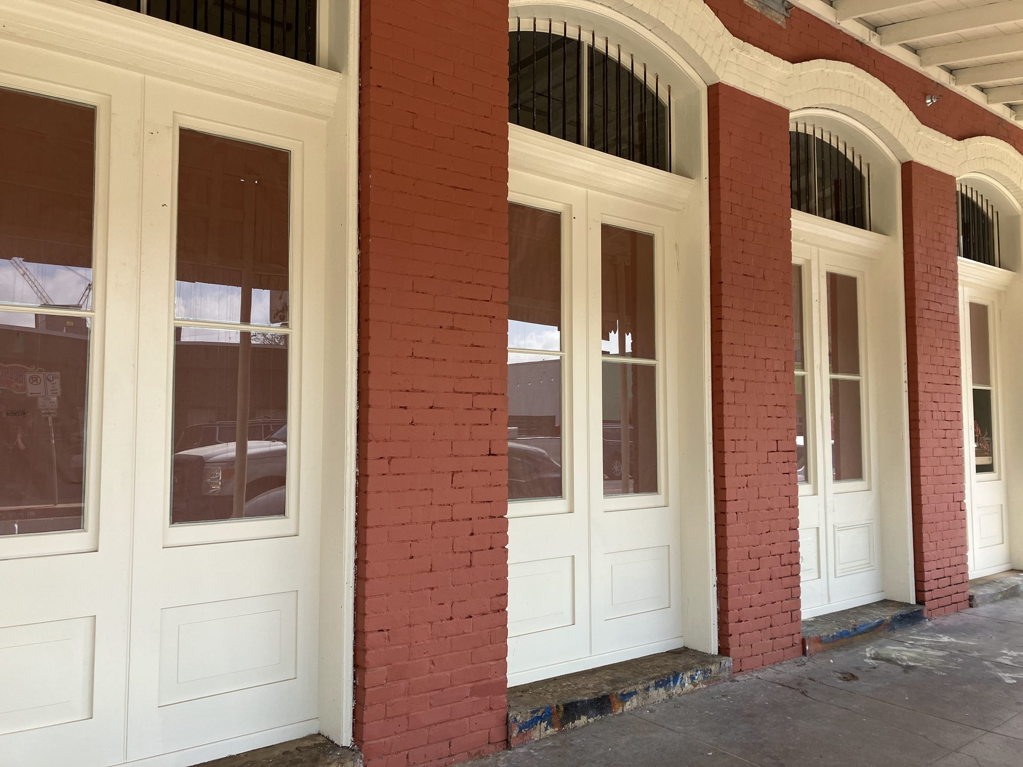 Window restoration at Uptown Sports Club in East Austin