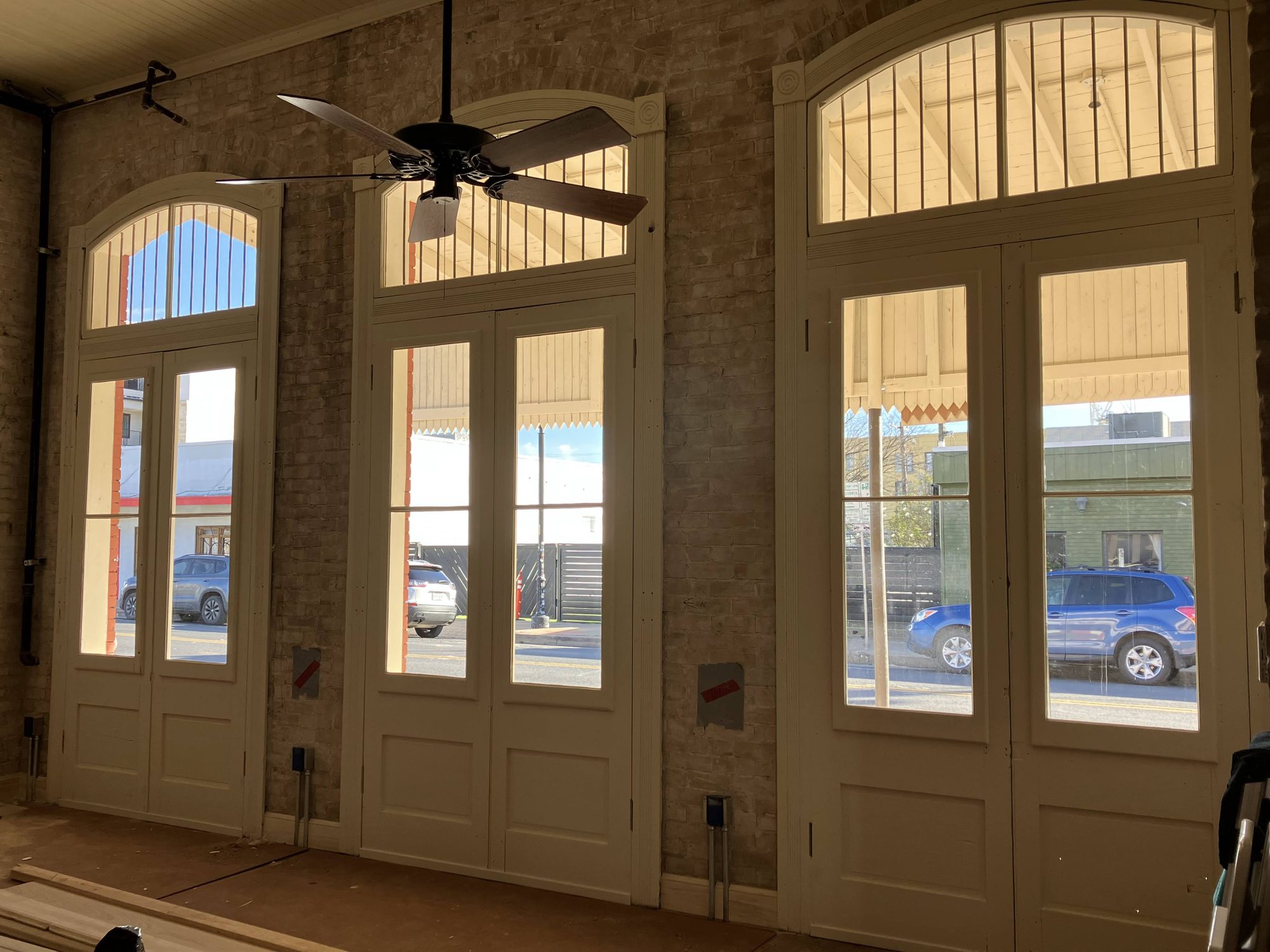 Restored window at the historic Uptown Sports Club building