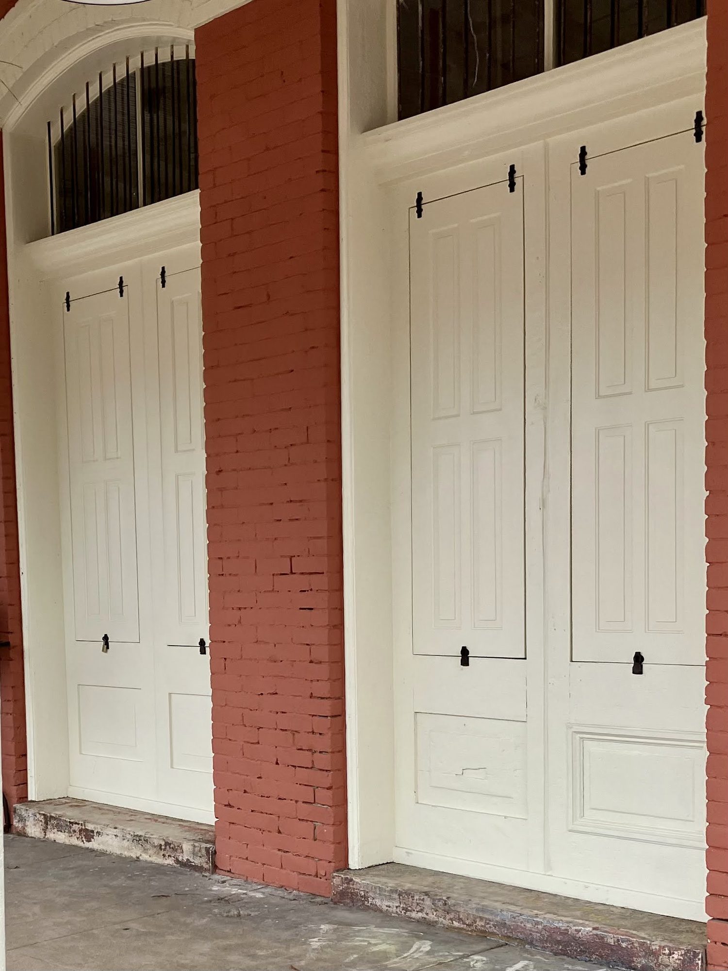 Uptown Sports Club window and door restoration in progress
