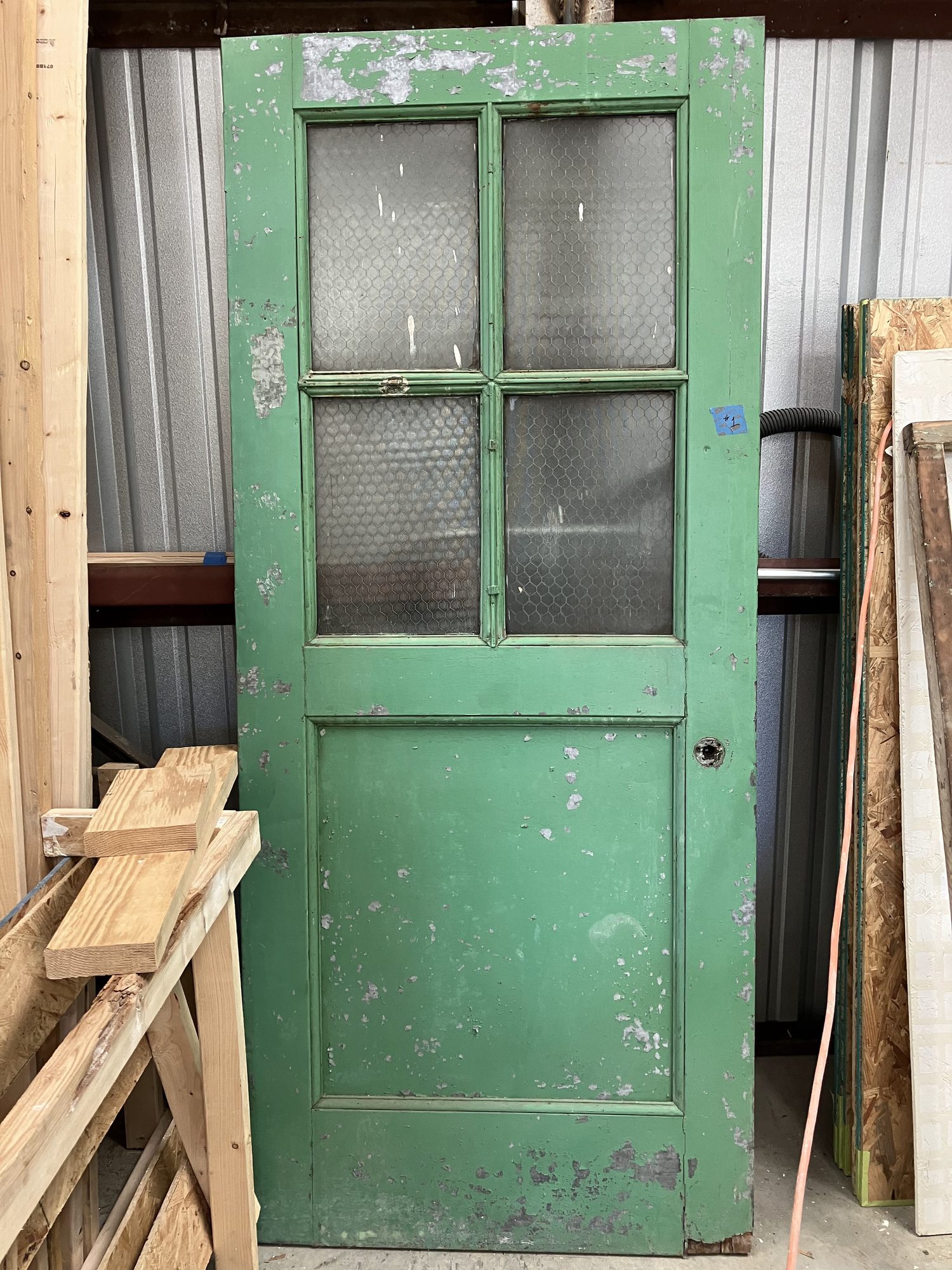 Door restoration detail at Uptown Sports Club